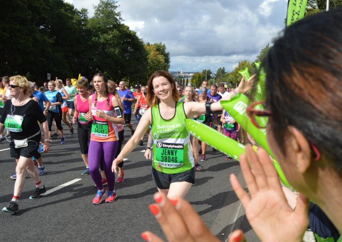 Barnardo's runner taking part in the Great North Run surrounded by other runners