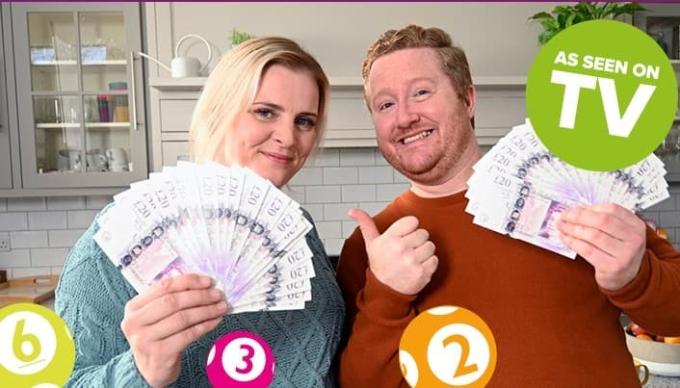 A couple holding their lottery winnings with a green circle that says "as seen on TV"