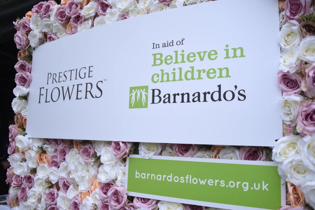 Placard promoting the Barnardo's and Prestige Flowers partnership 
